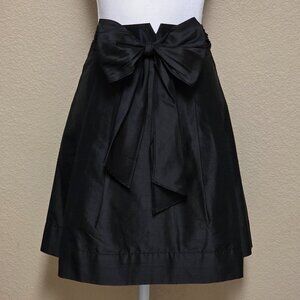 Trina Turk Bow-Tie Front Pleated Mini Skirt